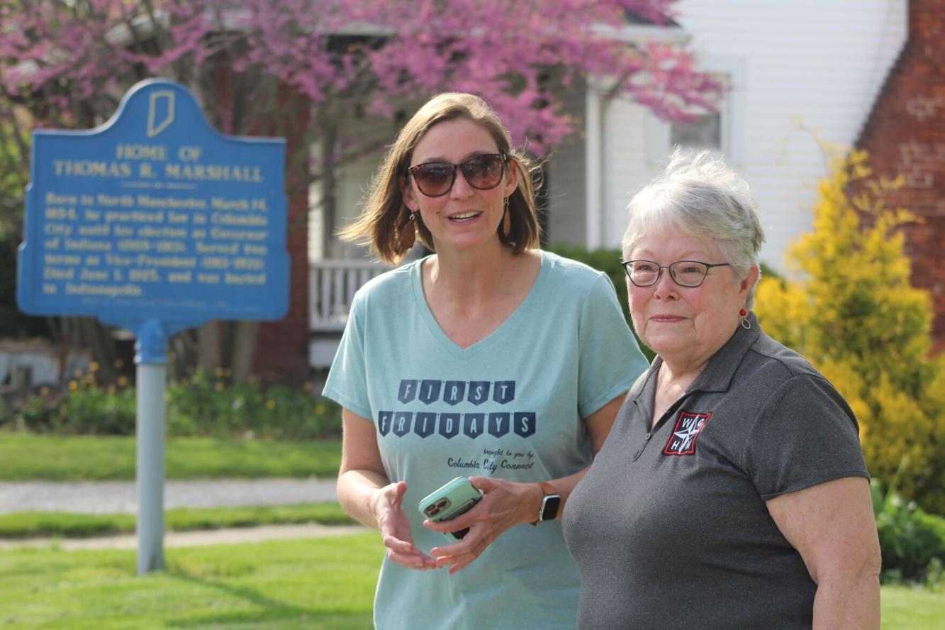 Nikki Keister, executive director of Columbia City Connect, stands with Pam Koch, curatorial technician at the Whitley County Historical Museum. Koch’s book “Around the Square” was used to provide the details at each stop on the new Downtown Historic Walking Tour.