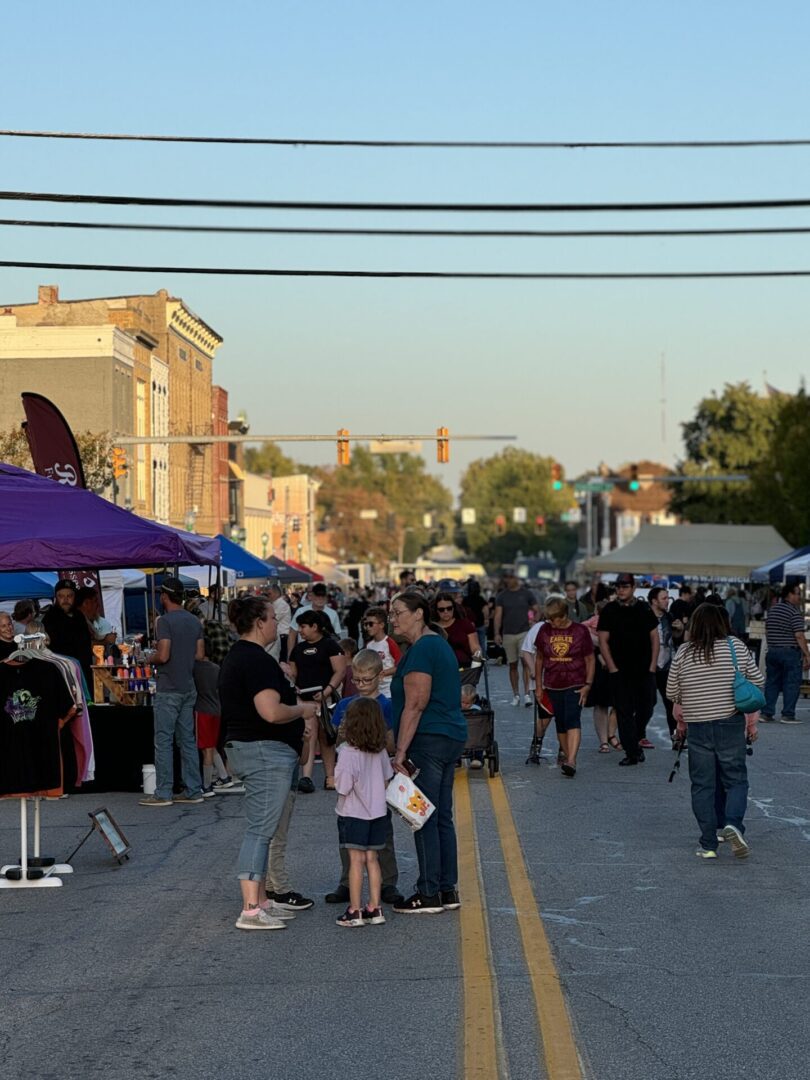 View of the crowd gathered in downtown Columbia City at Columbia City Connect's First Fridays