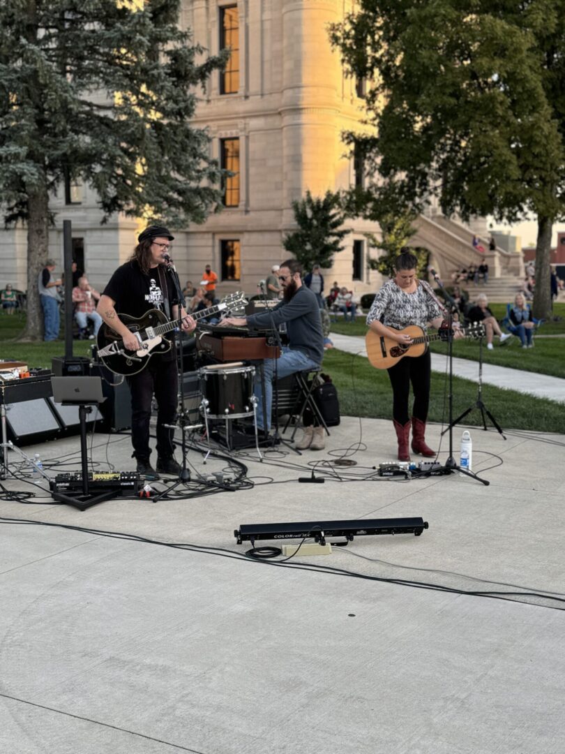 Shiny Shiny Black musical performance from the corner of the Courthouse square at Columbia City Connect's First Fridays