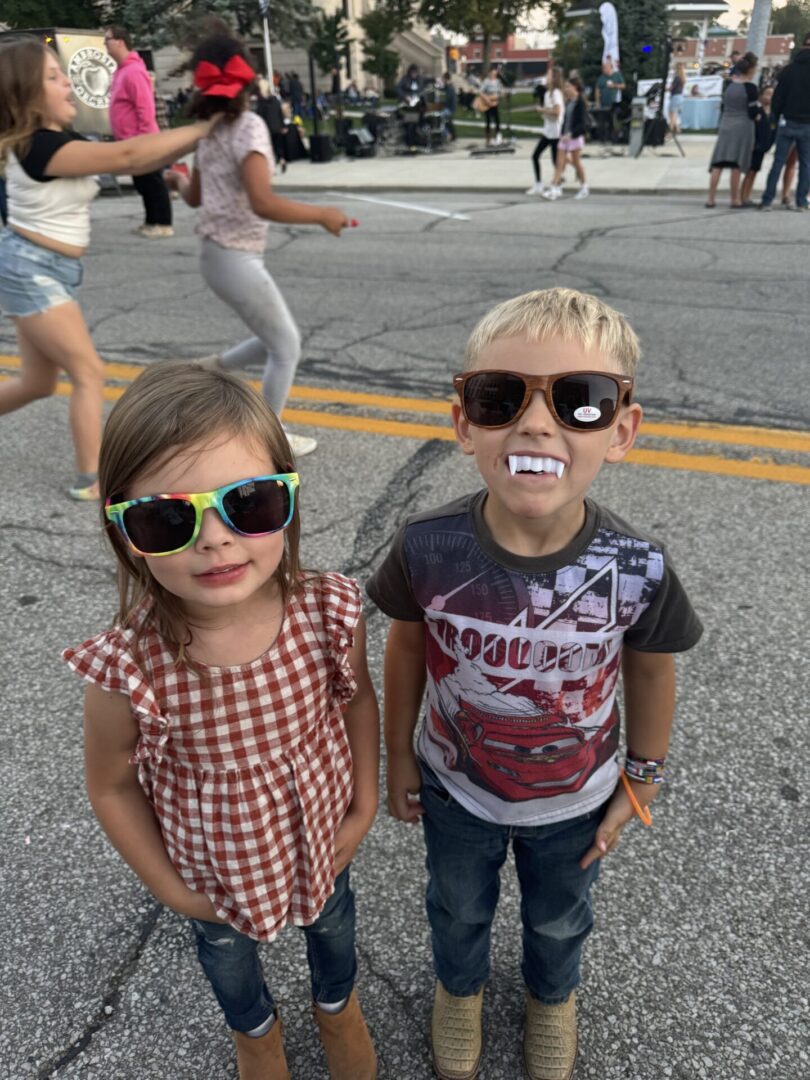 Two children with sunglasses on