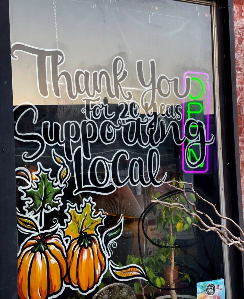 Thank you for 20 years message written on Brewha Coffee House window