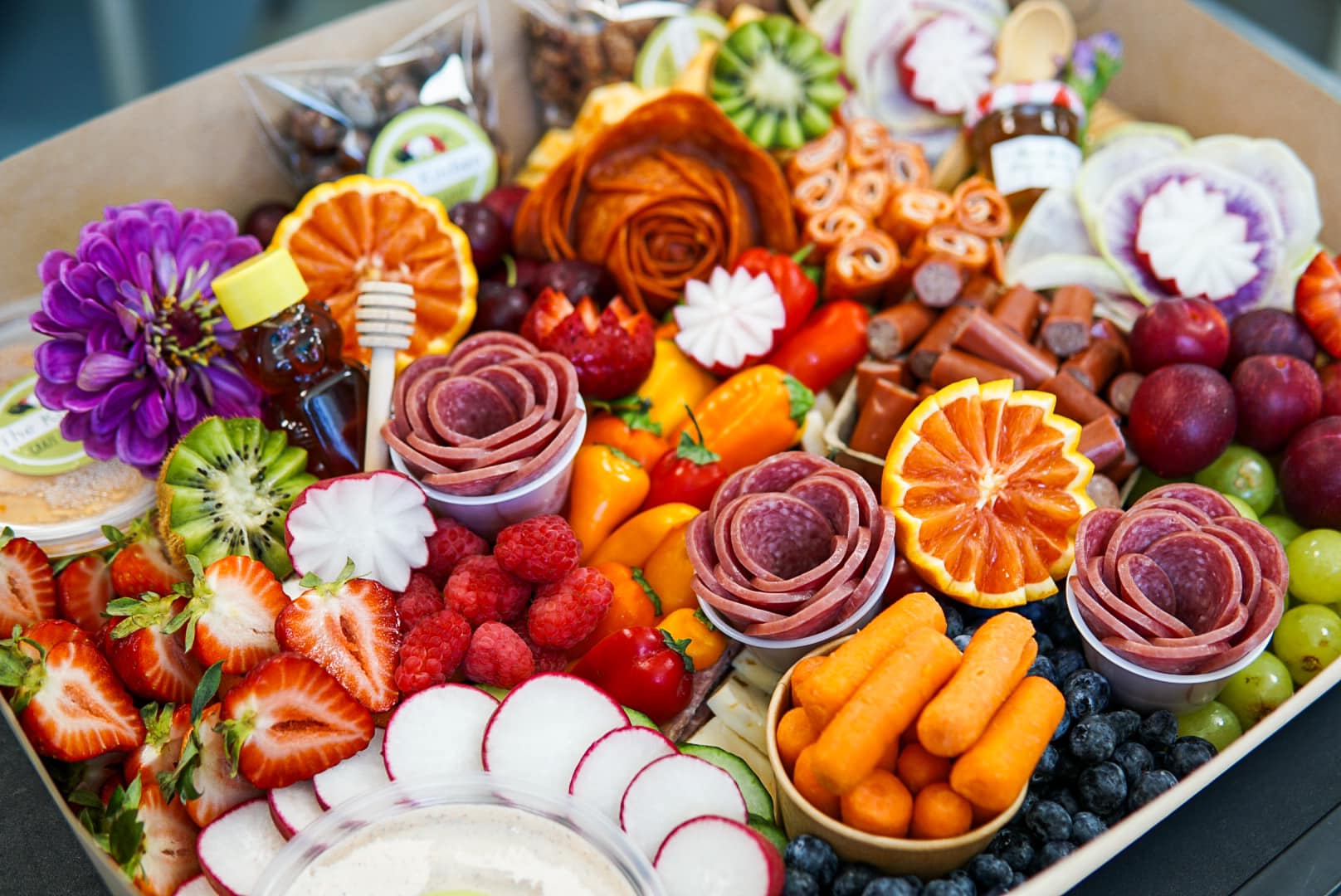 Grazing box will meats vegetables fruits and dip from The Kitchen