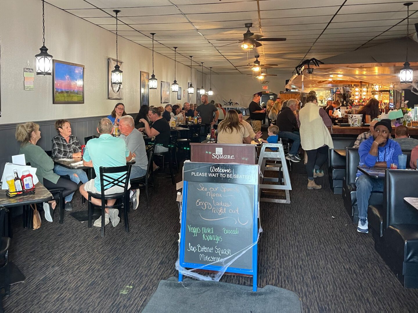 Patrons dining at The Square